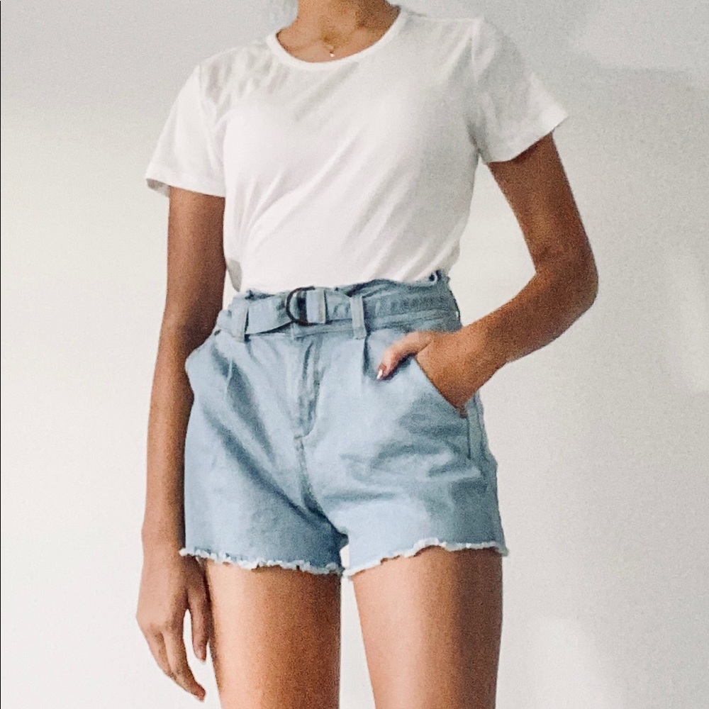 Joe’s Jeans: Blue ruffle shorts with denim belt